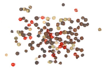 Colorful mixed pepper grains isolated on white background, top view