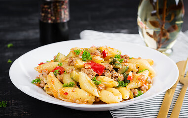 Conchiglie pasta. Italian pasta shells with minced meat, zucchini, tomato and sweet peppers.