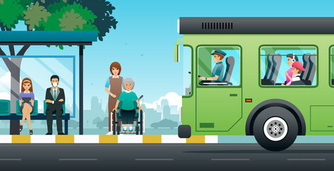 The bus driver stopped safely to pick up passengers and wheelchair users at the stop.  © intararit