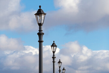 Fototapeta na wymiar street lanterns on background sky