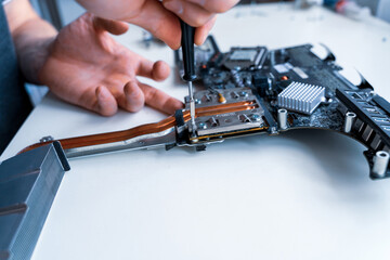 Computer maintenance. Pc technician repair service with laptop on hardware background. Maintenance...