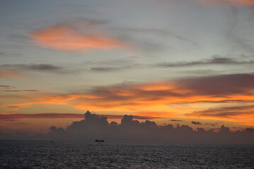 Sunset in Sri Lanka. Golden sunset on the sea. Ships at sunset. Sunset on the ocean. Sunrise.
