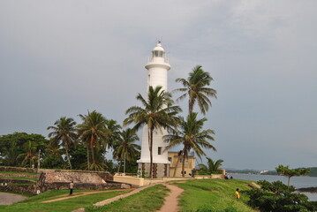 Lighthouse in Sri Lanka. Halle. Lighthouse on the island. Palm Island.