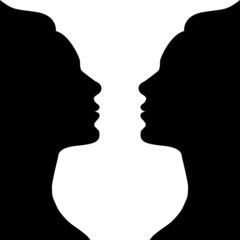 Silhouette of a couple. Silhouettes of two lovers. Happy valentines day vector illustration isolated on white background. Abstraction vase, optical illusion.