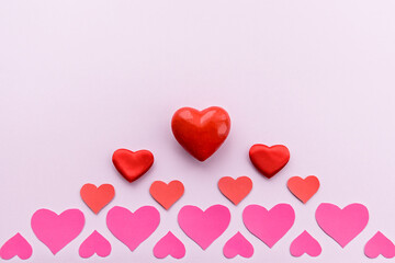 Red hearts on a romantic pink background. valentine's day. Romance and love.