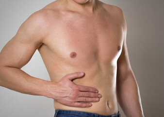 Obraz premium Pain in the liver. The man's side hurts