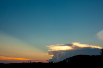 Beautiful sunset in Long Hai beach, Ba Ria Vung Tau Viet Nam, sea coast with mountains and blue sky, and sunlight