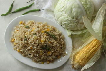 Cabbage corn fried rice. A tasty rice dish with sauteed cabbage and corn flavoured with garlic.