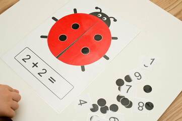 Ladybug table game. logical excersice. dots and numbers. create your own mathematical equation. implement for primary school and children with disabilities.