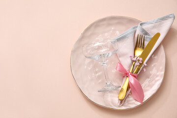 Stylish table setting on pink background