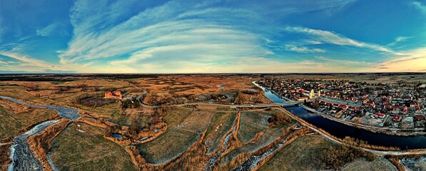 Panorama.View from the top of the backwaters of the Narew river ice-bound in winter.