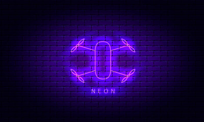 Neon quadcopter icon on a brick wall background, vector illustration