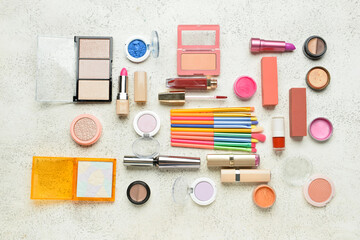 Naklejka premium Different makeup products on light background