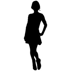 black silhouette of slender girl with short haircut in short skirt