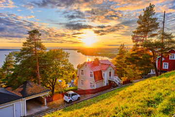House on the hill in sunset  - obrazy, fototapety, plakaty
