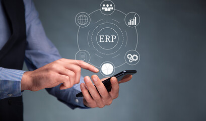 man holding smartphone with ERP