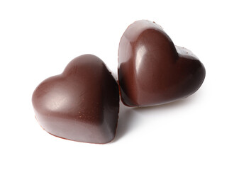 Tasty heart-shaped candies on white background