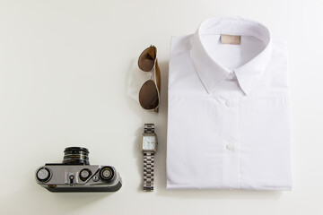 casual outfits with accessories on white background.