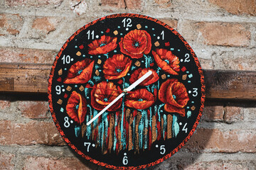 painted wall clock caught on a wooden plank