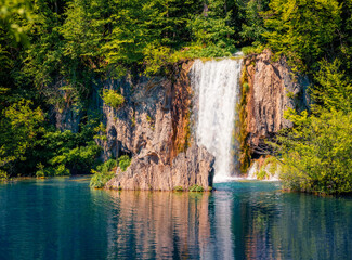 Obraz na płótnie Canvas Sunny summer view of waterfall in Plitvice National Park. Spectacular morning scene of Croatia, Europe. Beauty of nature concept background.