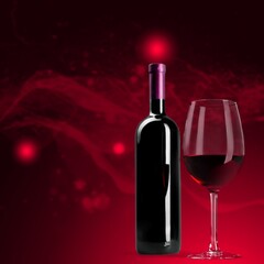 Bottle and glass of red wine on a desk and red background.