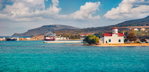 Panoramic summer view of Saint Spiridon Greek Orthodox church and Elafonisos port. Beautiful...