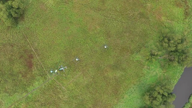 Station science research for studying wetlands meadows, drone aerial video shot ecosystem weather station swamp willows cycle carbon flux eddy covariance methane research physiological photosynthesis