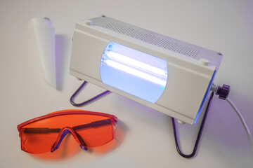 A device for disinfection of the room at home. UV medical irradiator.