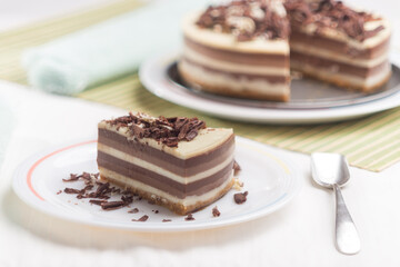 Delicious homemade cake of three lactose-free chocolates