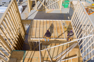 Beam stick built frame of new house under construction
