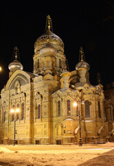 Fototapeta na wymiar Assumption Cathedral in St. Petersburg at night illumination in winter. Built on Vasilyevsky Island in the 19th century.