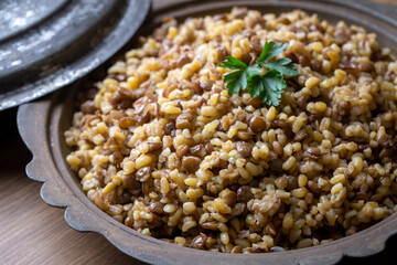 Traditional delicious Turkish foods; bulgur pilaf with green lentils (Turkish name; yesil...