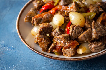 Traditional Turkish meal with delicious meat; onion stew with meat (Turkish name; etli sogan yahnisi, et kavurma)