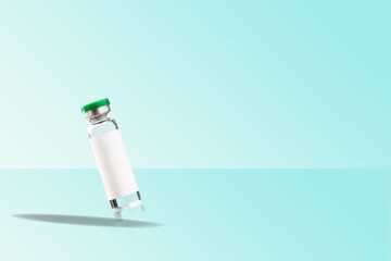COVID-19 VACCINE for new strain. Ampoule on an abstract light background. Concept new variant of...