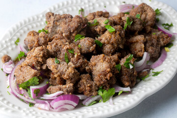 Liver pan (Albanian liver) Turkish traditional food. Liver over rice. (Turkish name; arnavut ciger)