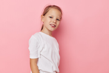Portrait of happy smiling child girl grimace posing fun isolated background