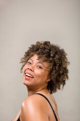 Studio shot of woman smiling