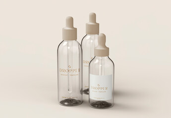 Three Glass Dropper Bottles Mockup