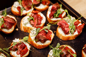 Top view of Bruschettas with beef
