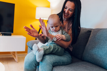 Mom enjoying time with her toddler son at home