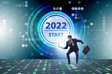 Fototapeta na wymiar Businessman in the concept of year 2022