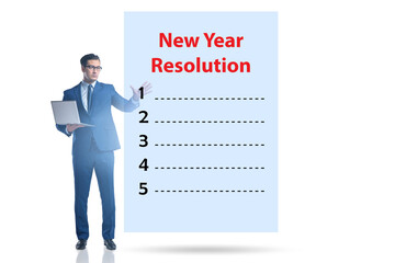 Businessman in new year resolution concept