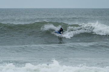 Bodyboarder performing a 360 trick