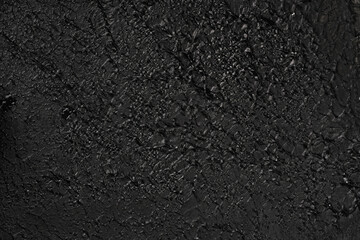 Black concrete textured surface, photography background