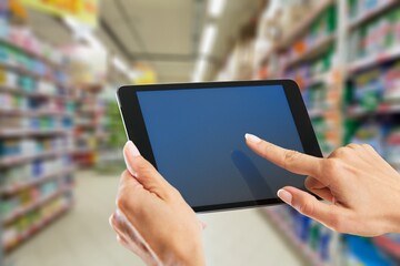 Smart retail management system.Worker hands holding digital tablet