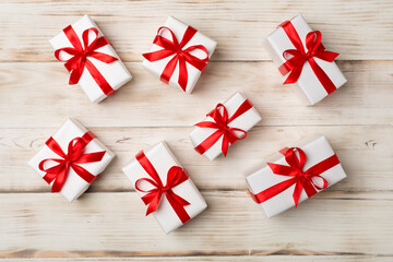 Top view of gift boxes on wooden background