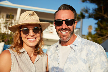 Summer is the happy season. Shot of an affectionate mature couple spending some quality time together.