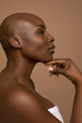 Profile of woman with shaved head