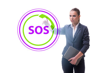 Businesswoman pressing SOS button in case of danger