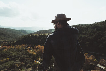 Portrait of a 30s man with a fedora and shirt